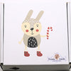 whimsical animal design on white kraft square box